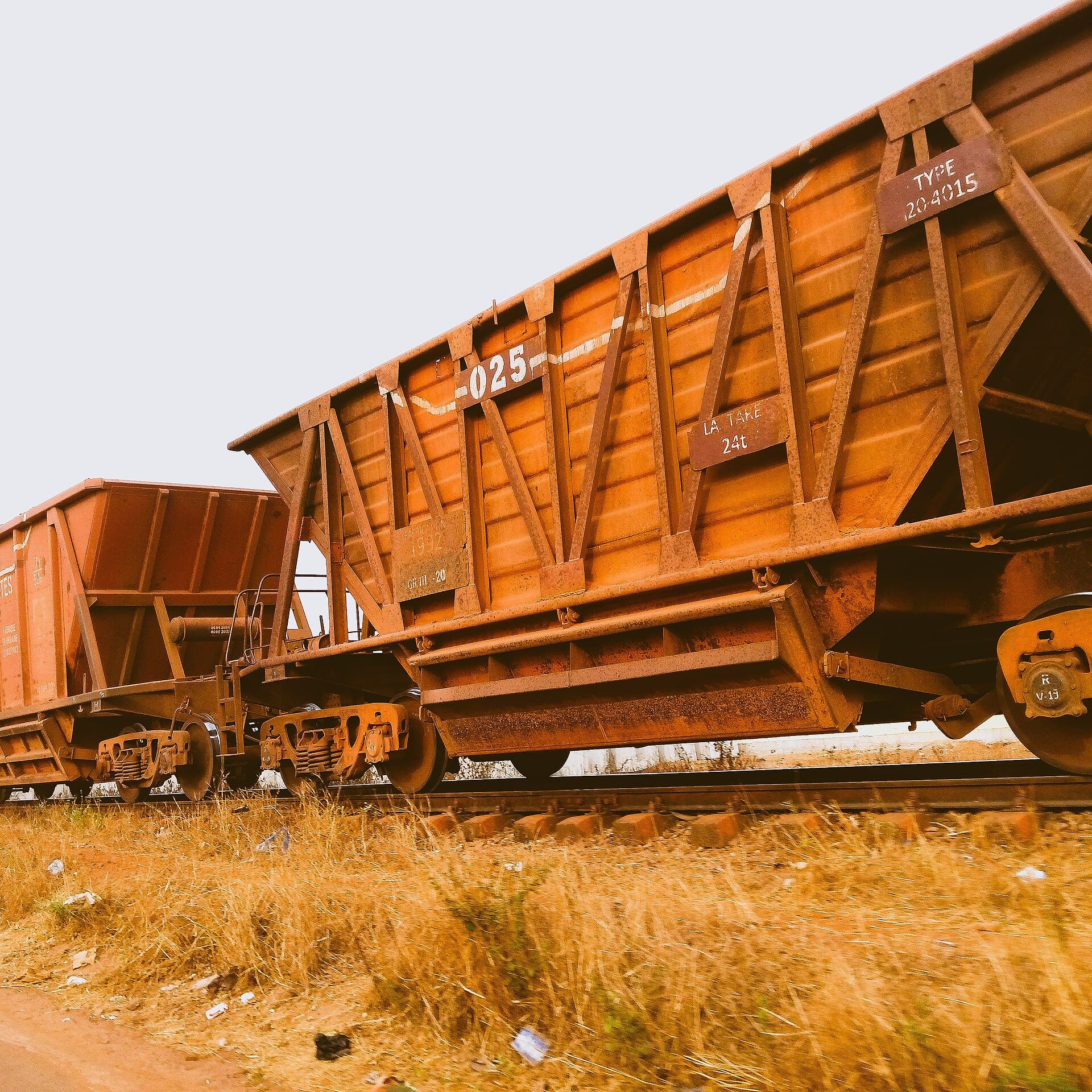 Ore wagons loaded with bauxite on the CBK line, Kindia, Guinea